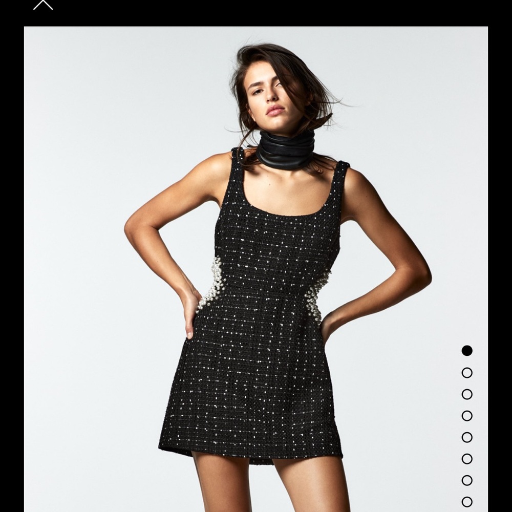 Tweed black dress with pearls on side cut out